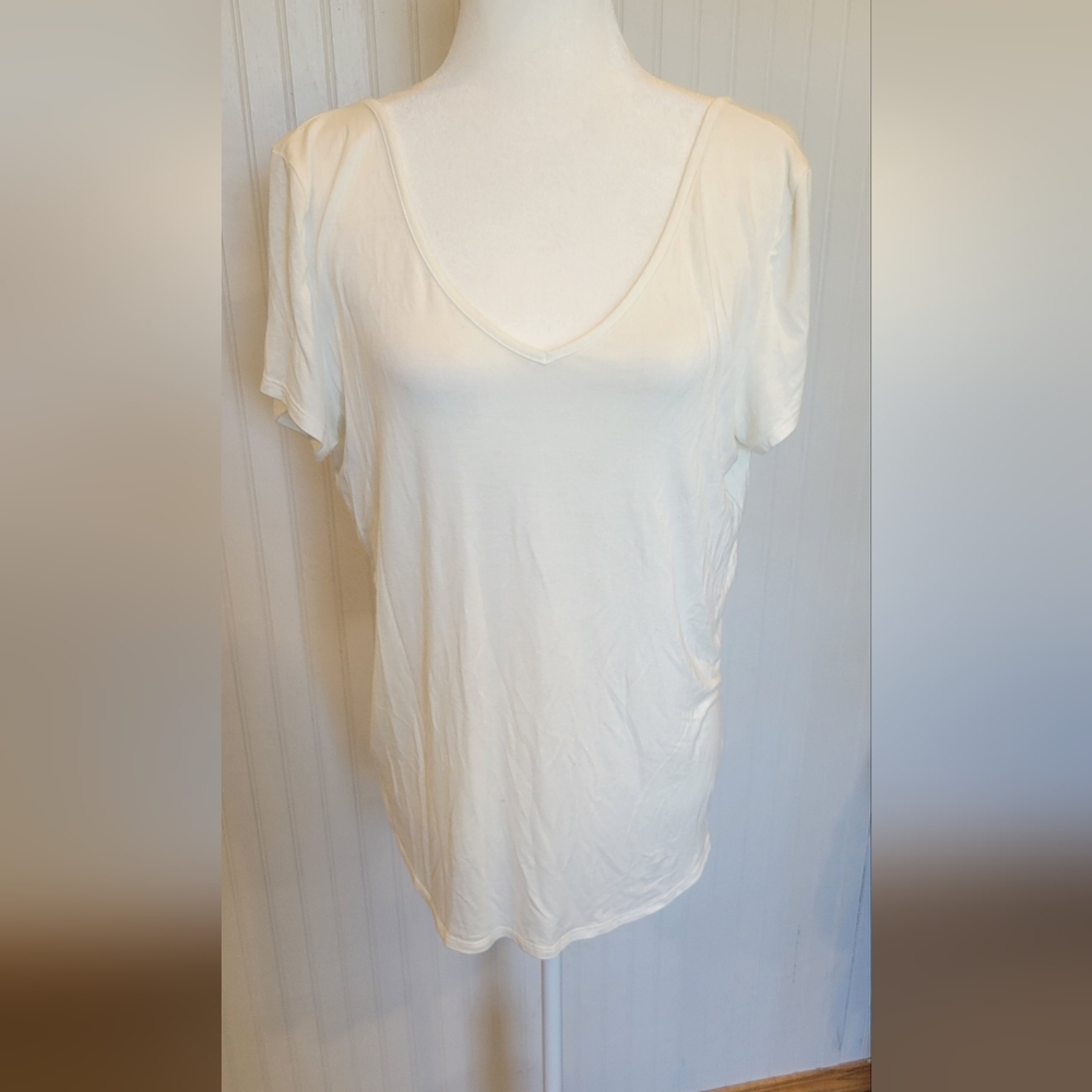 Daytrip, size lg, white blouse with sleeves and open back that ties on bottom